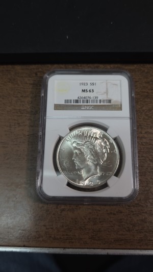 1923 Peace Dollar MS63 — photo 1
